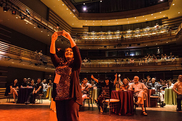 A woman takes a selfie at the Latino Film Festival