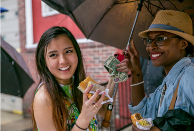 Community members enjoying the Baltimore Avenue Dollar Stroll