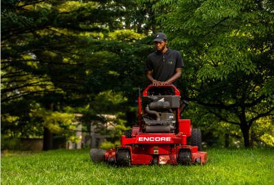 Man mowing grass