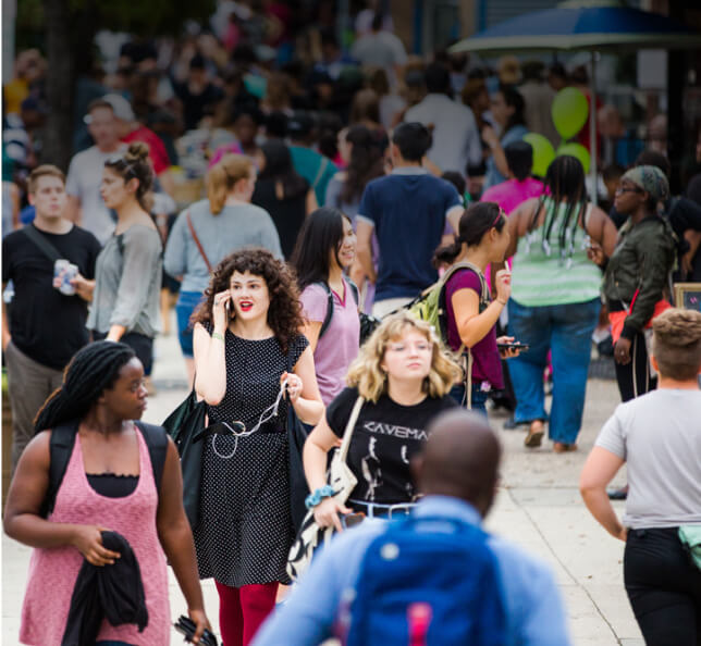 Community members on lively street in University City