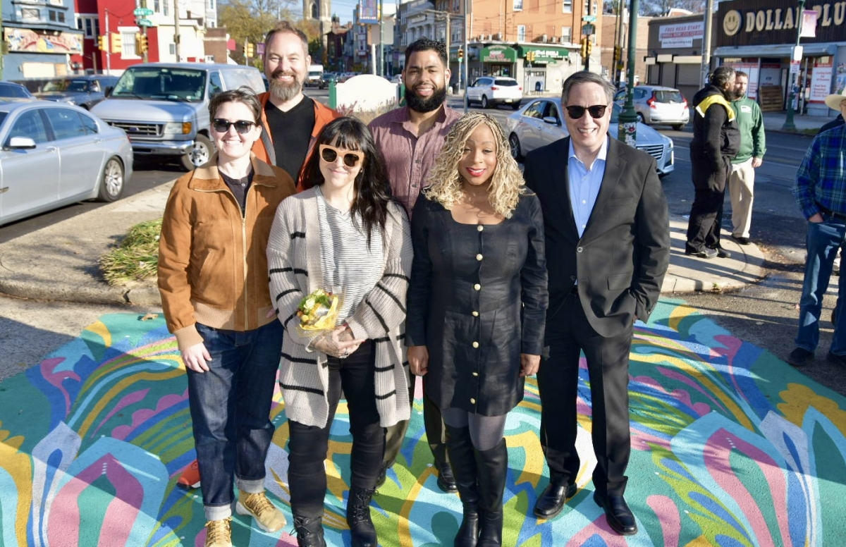 Artist Lawren Alice and others at the unveiling of the new cedar park ground mural