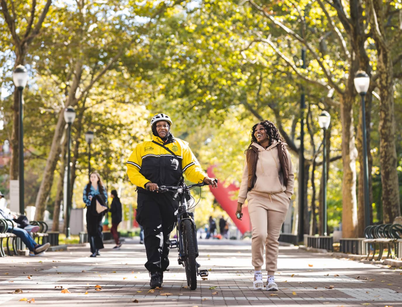 University City District Woman Walking with Safety Officer