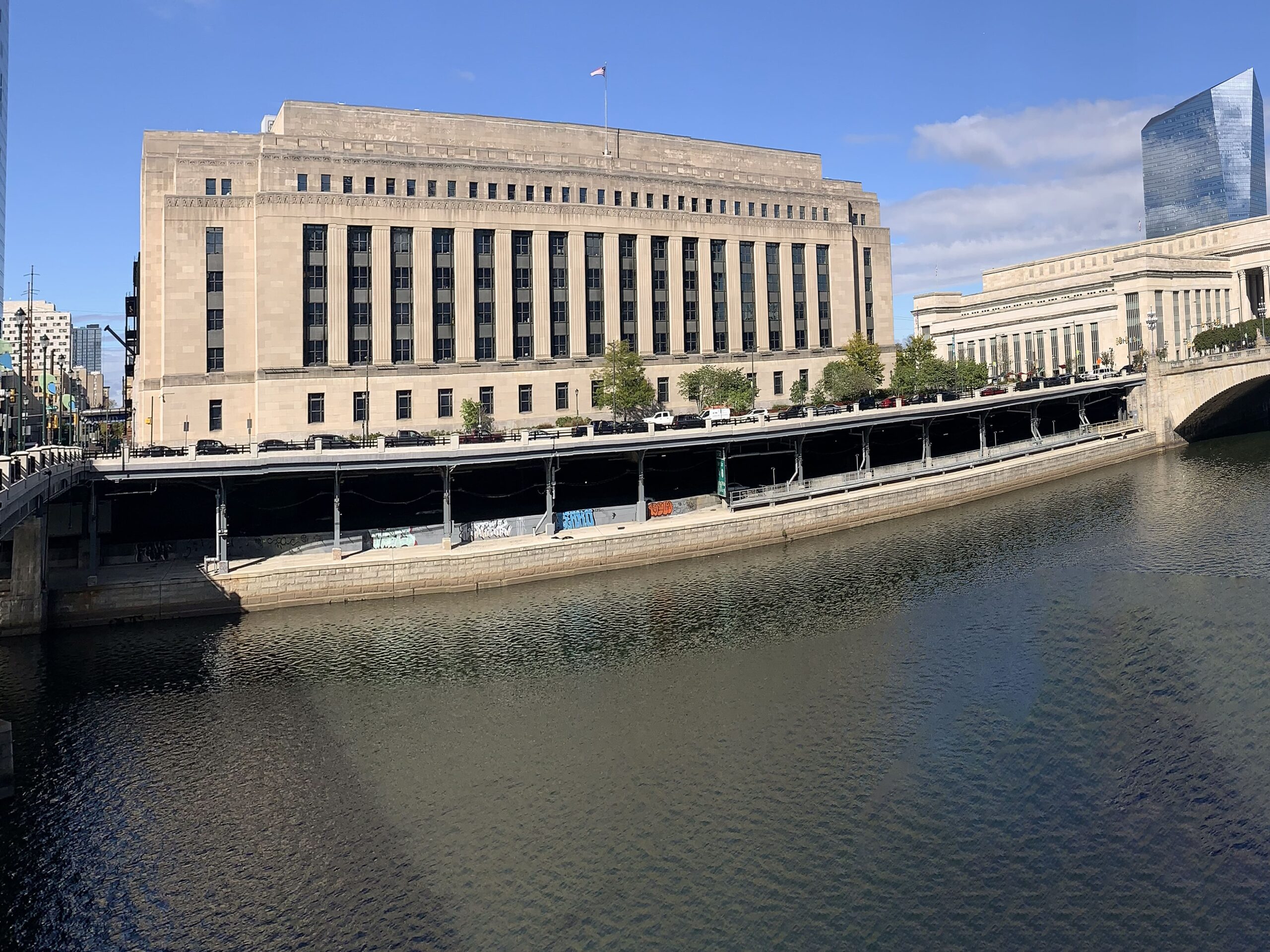 A view of the West Philly Waterfront showing existing structures along the river before redevelopment efforts.