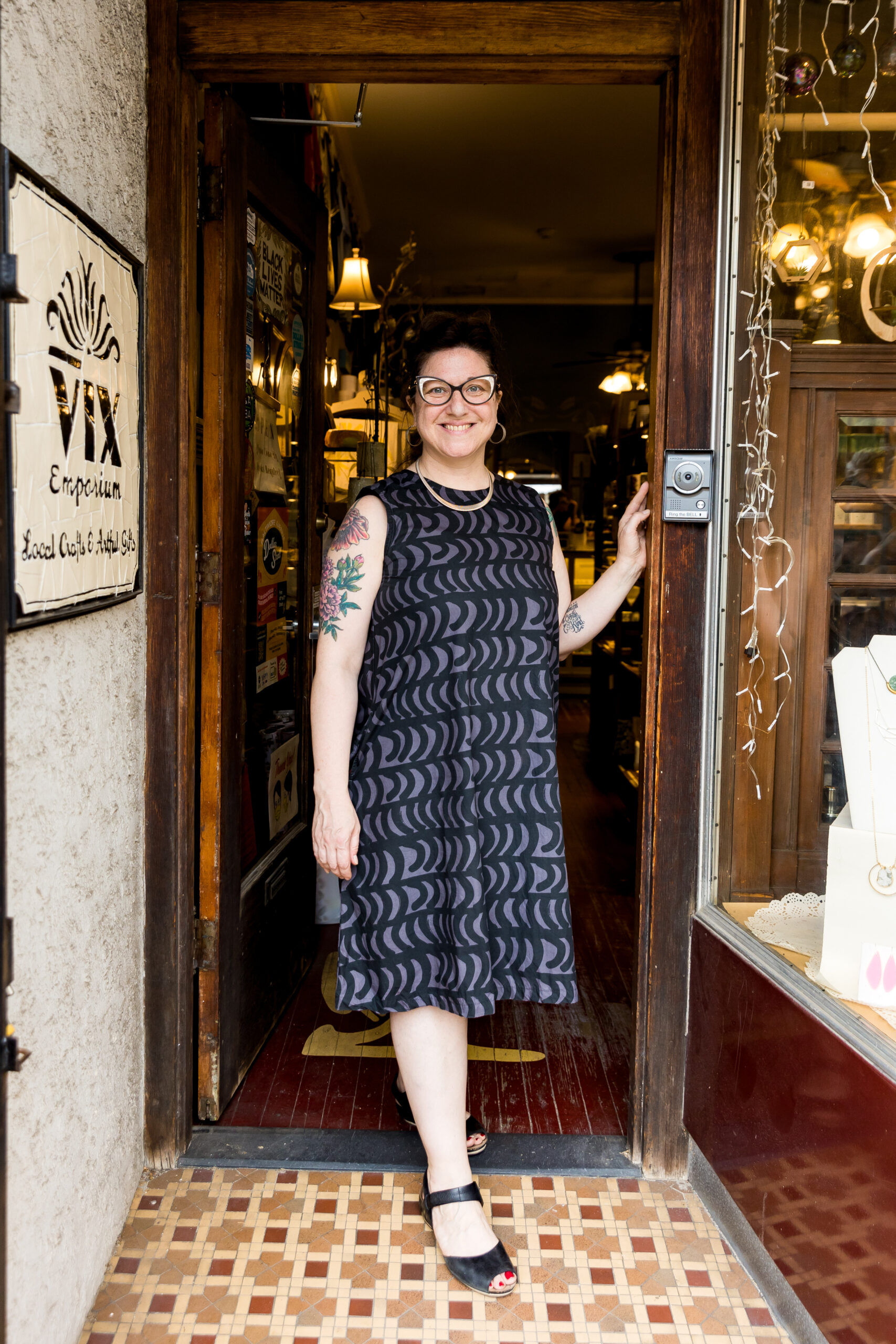 Emily Dorn stands outside her shop VIX Emporium on Baltimore Avenue