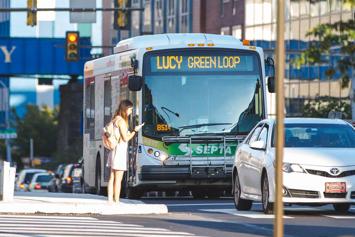 SEPTA LUCY bus driving down a West Philadelphia street