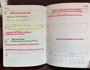 A planning notebook with multiple colors for highlighting