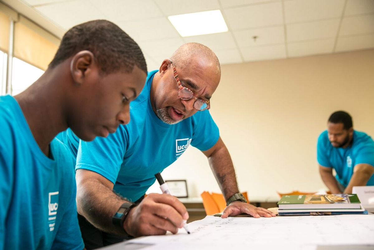 A Skills Initiative participant receives instruction in the classroom.