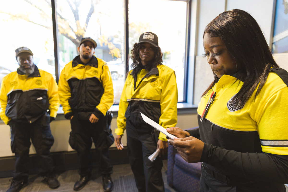 UCD Safety Ambassadors in a meeting discussing their deployment for the day./