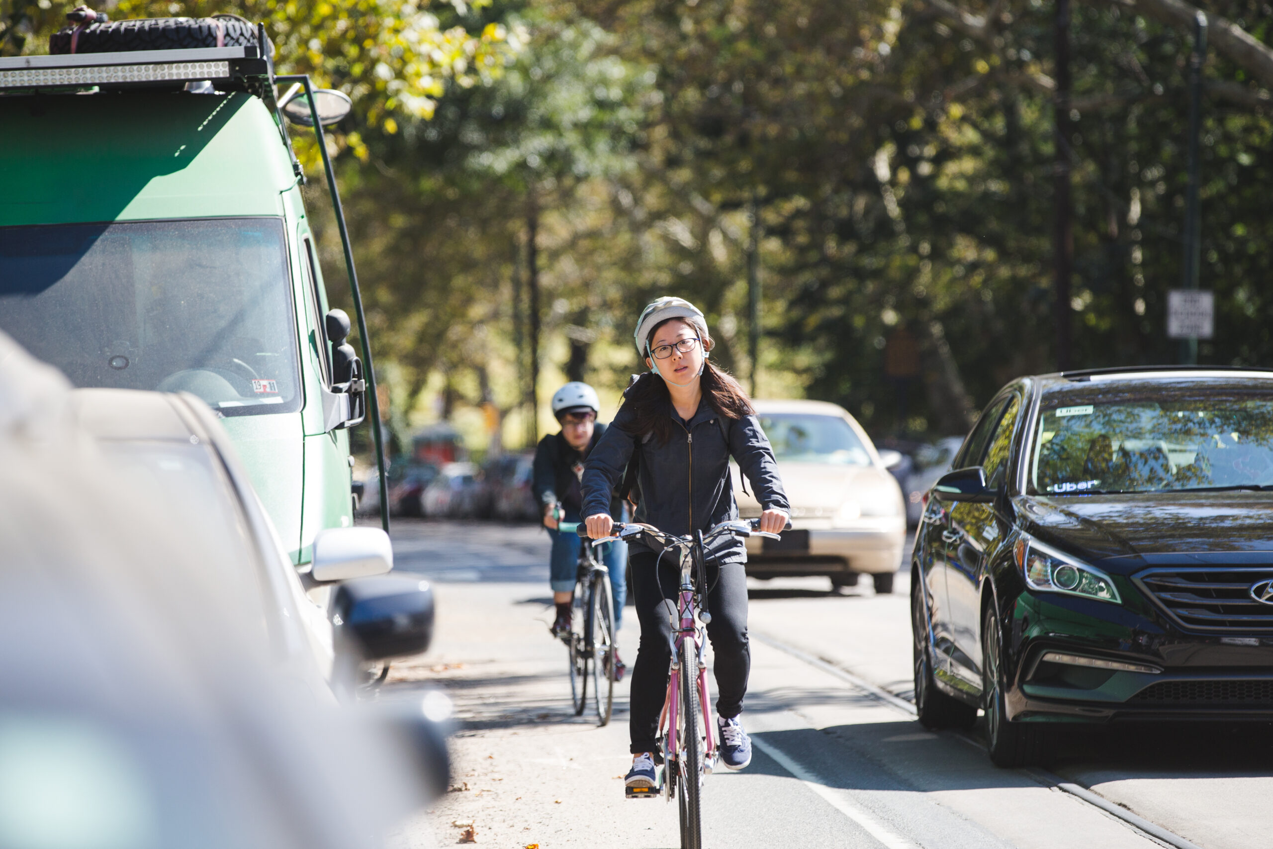 A cyclist riding a bike on Baltimore Avenue