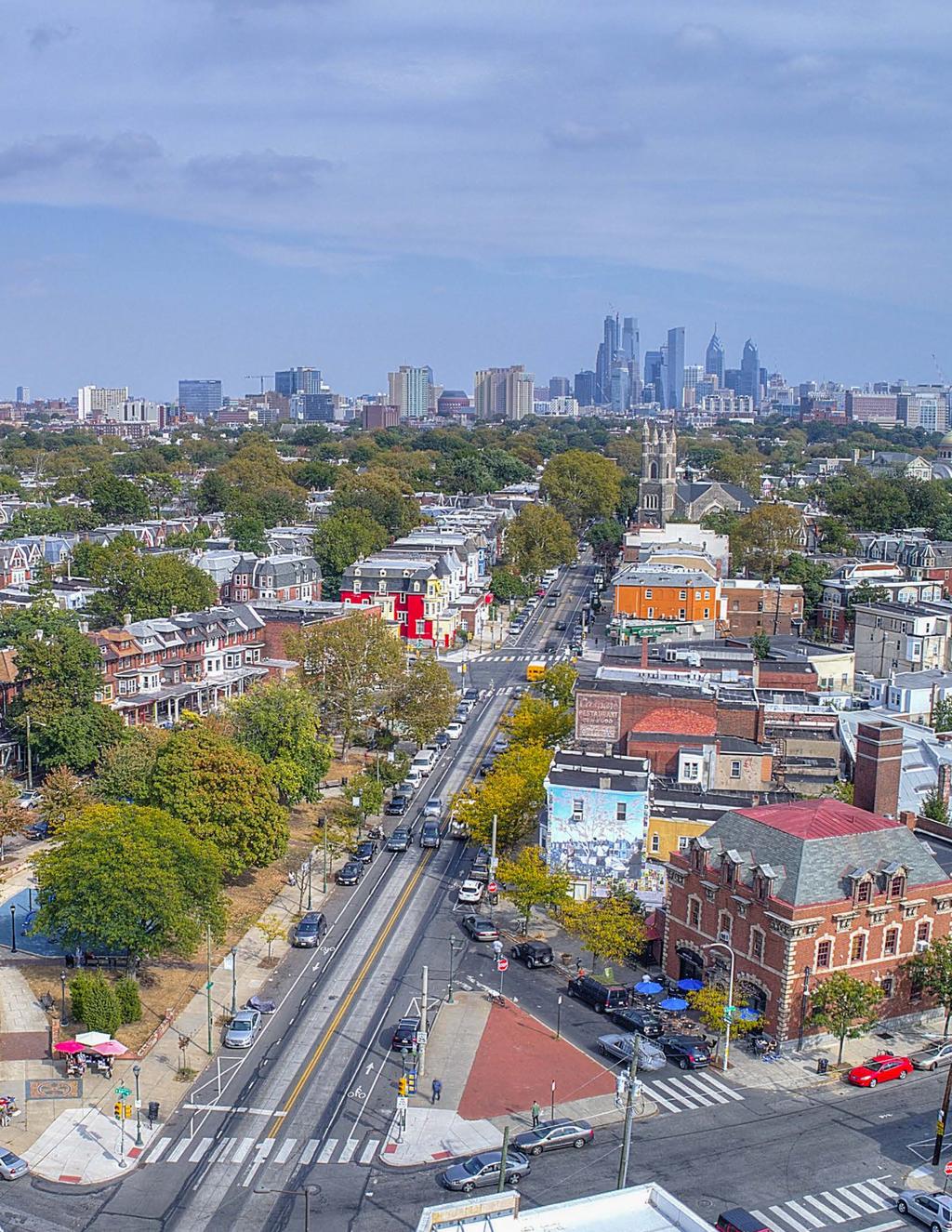 Aerial photo of Baltimore Avenue, which is lined with houses and trees.