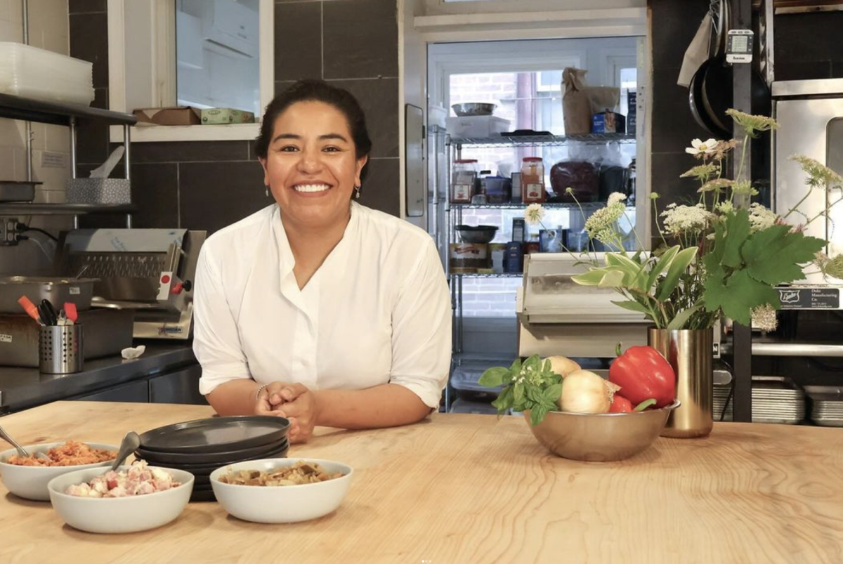 Jezabel Careaga standing inside her namesake Argentinian restaurant at 206 S. 45th Street