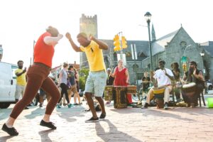 People dancing at a Dollar Stroll