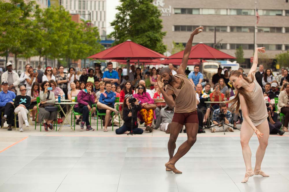 Two dancers from Ballet X performing at The Porch at 30th Street Station.