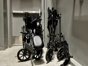 Two foldable wheelchairs