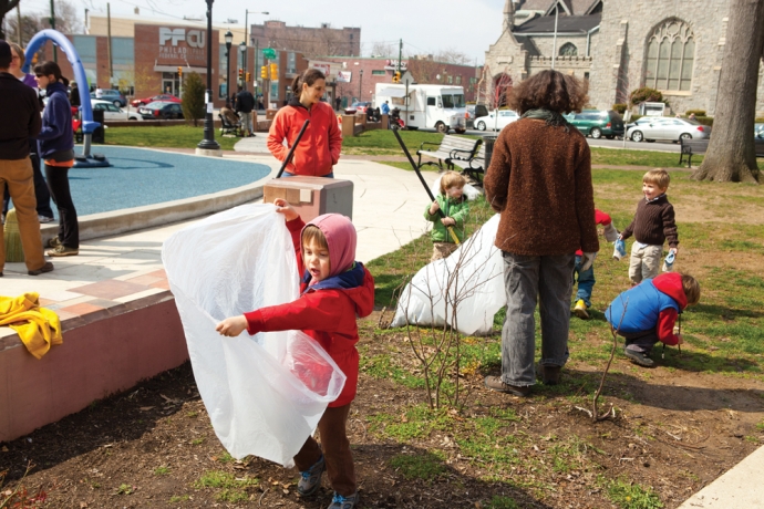 Neighbors participating in a community cleanup at Cedar Park